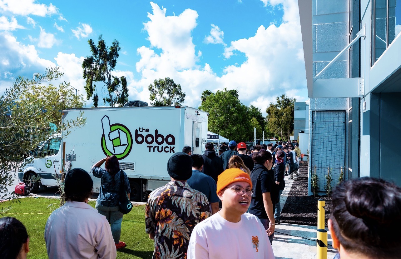 Grand opening event line with food vendor
