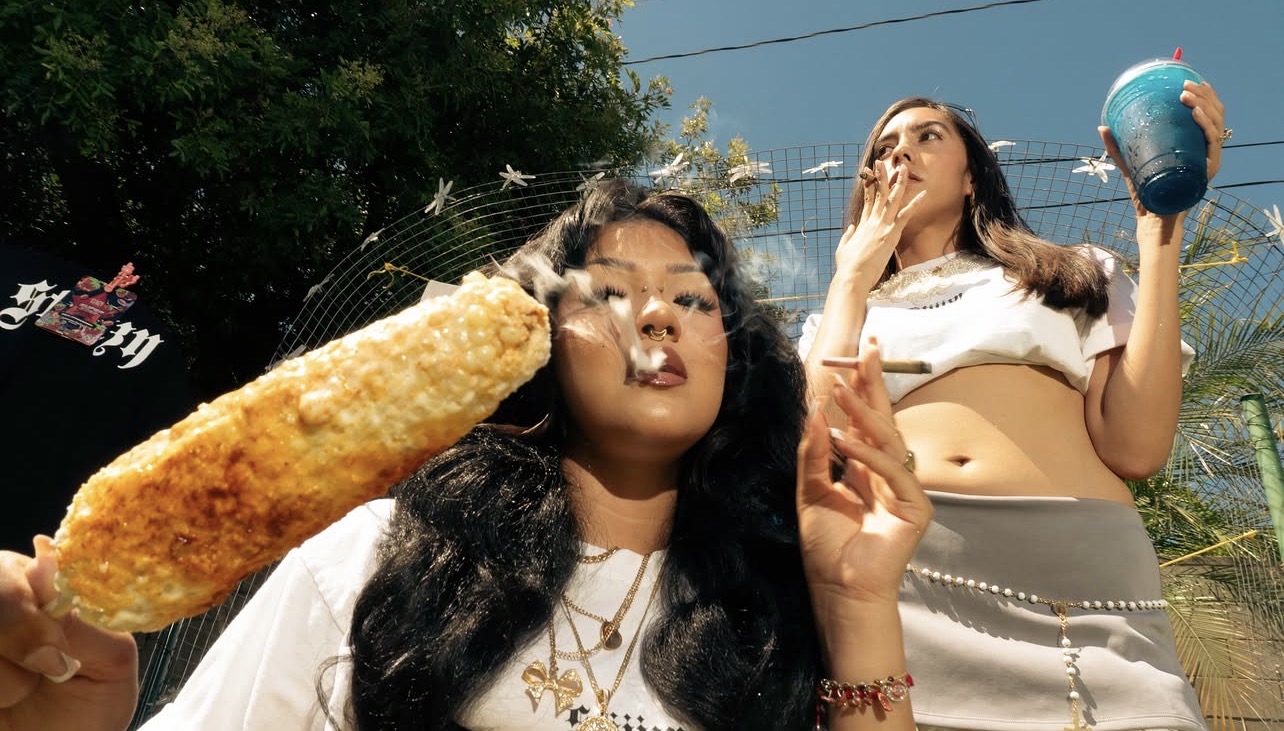 STIIIZY summer lifestyle moment with corn and a blue drink